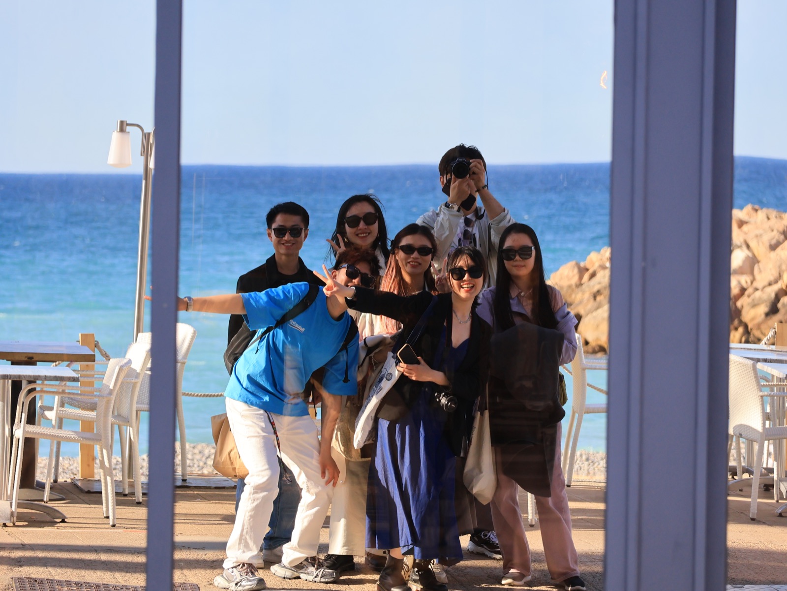 A group of friends by the sea in Nice